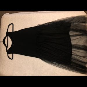 Knee length dress with tulle overlay